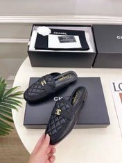 CHANEL 26S MULES IN BLACK LAMBSKIN FABRIC