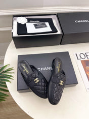 CHANEL 26S MULES IN BLACK LAMBSKIN FABRIC