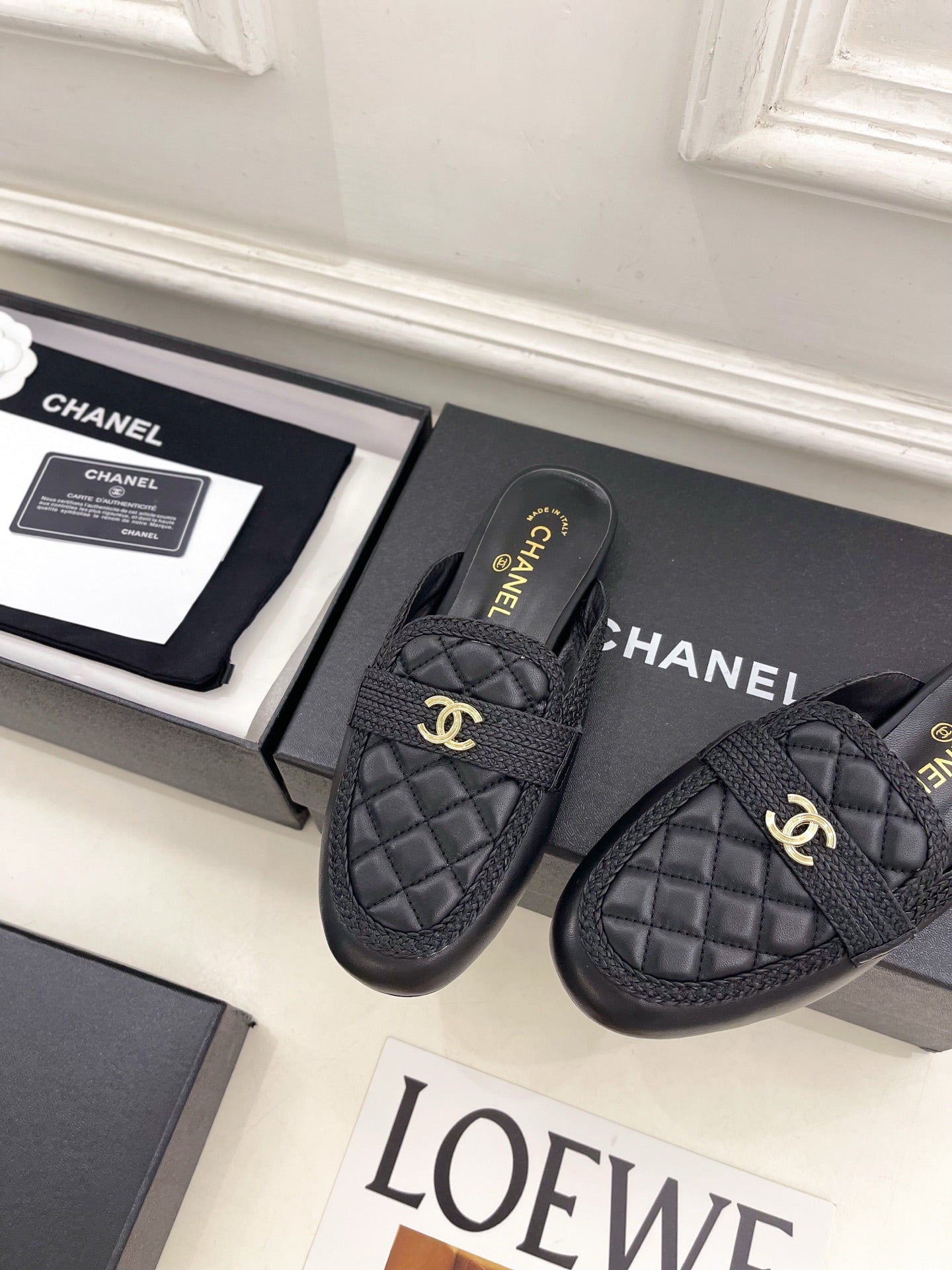 CHANEL 26S MULES IN BLACK LAMBSKIN FABRIC