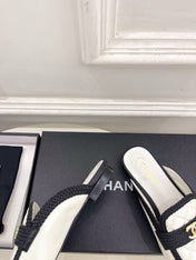 CHANEL 26S MULES IN WHITE LAMBSKIN AND BLACK FABRIC