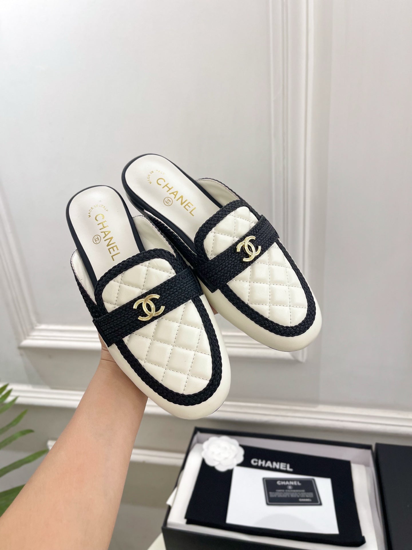 CHANEL 26S MULES IN WHITE LAMBSKIN AND BLACK FABRIC