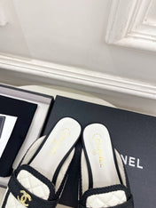 CHANEL 26S MULES IN WHITE LAMBSKIN AND BLACK FABRIC