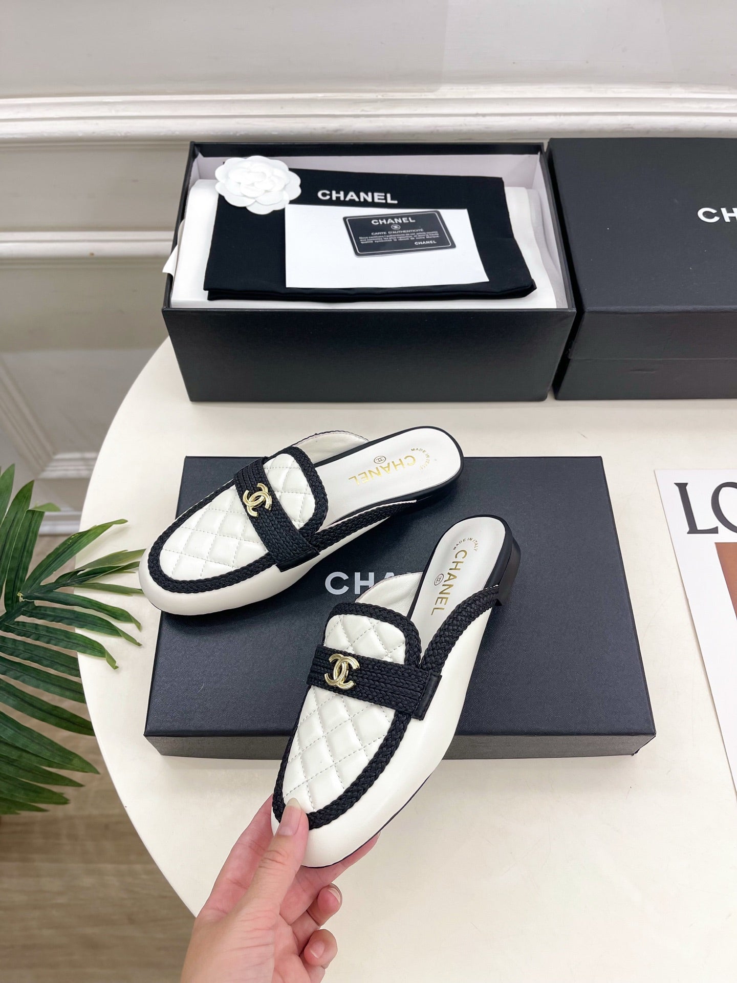 CHANEL 26S MULES IN WHITE LAMBSKIN AND BLACK FABRIC