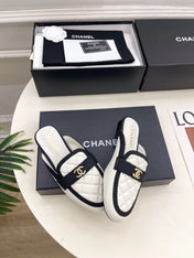 CHANEL 26S MULES IN WHITE LAMBSKIN AND BLACK FABRIC