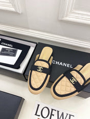 CHANEL 26S MULES IN BEIGE LAMBSKIN AND BLACK FABRIC