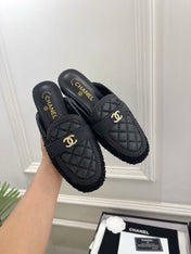 CHANEL 26S MULES IN BLACK LAMBSKIN AND TWEED