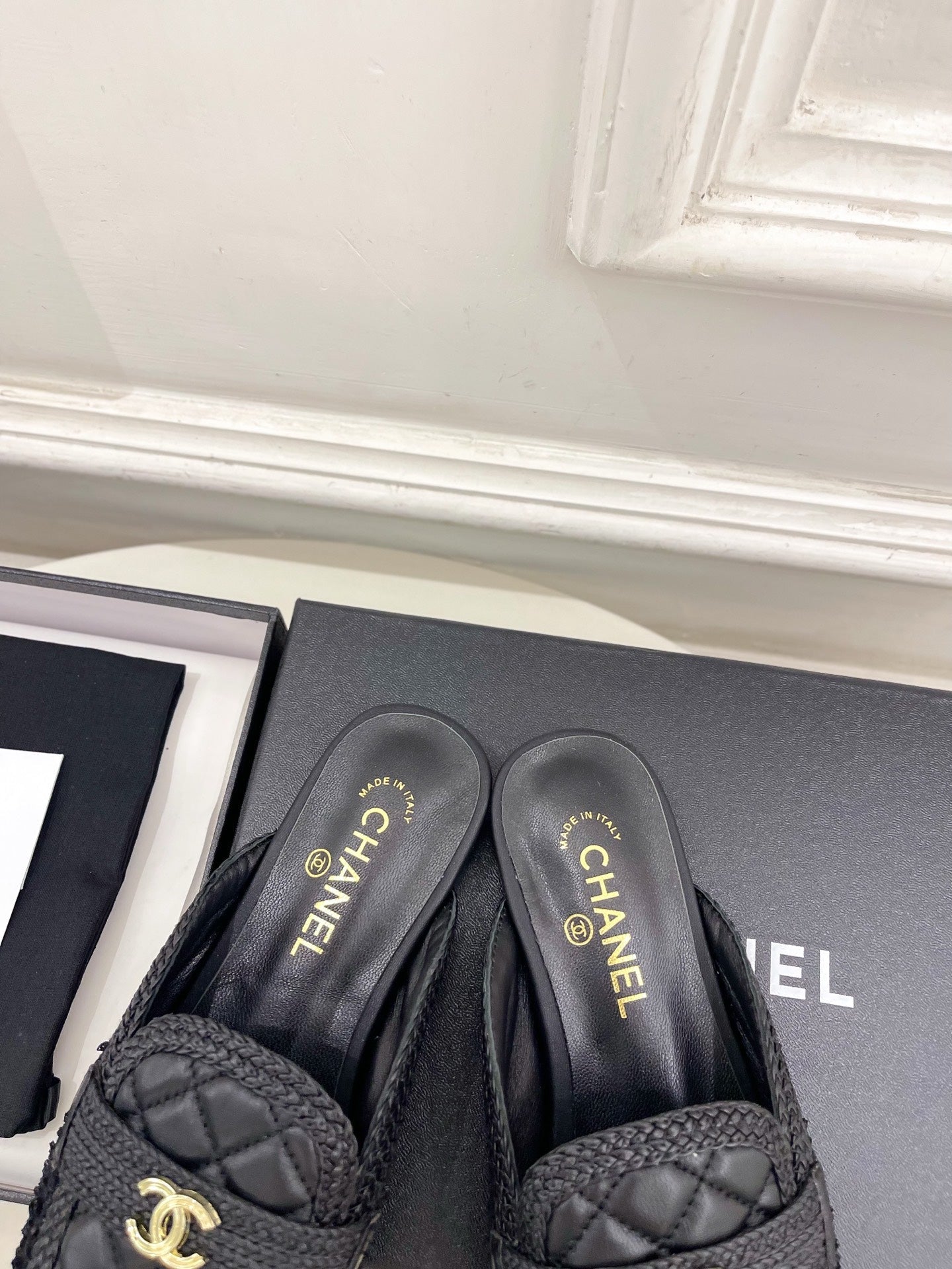 CHANEL 26S MULES IN BLACK LAMBSKIN AND TWEED