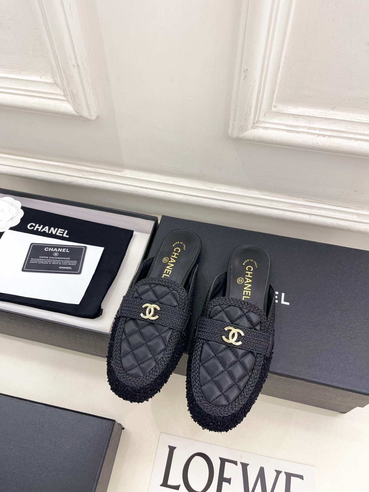 CHANEL 26S MULES IN BLACK LAMBSKIN AND TWEED