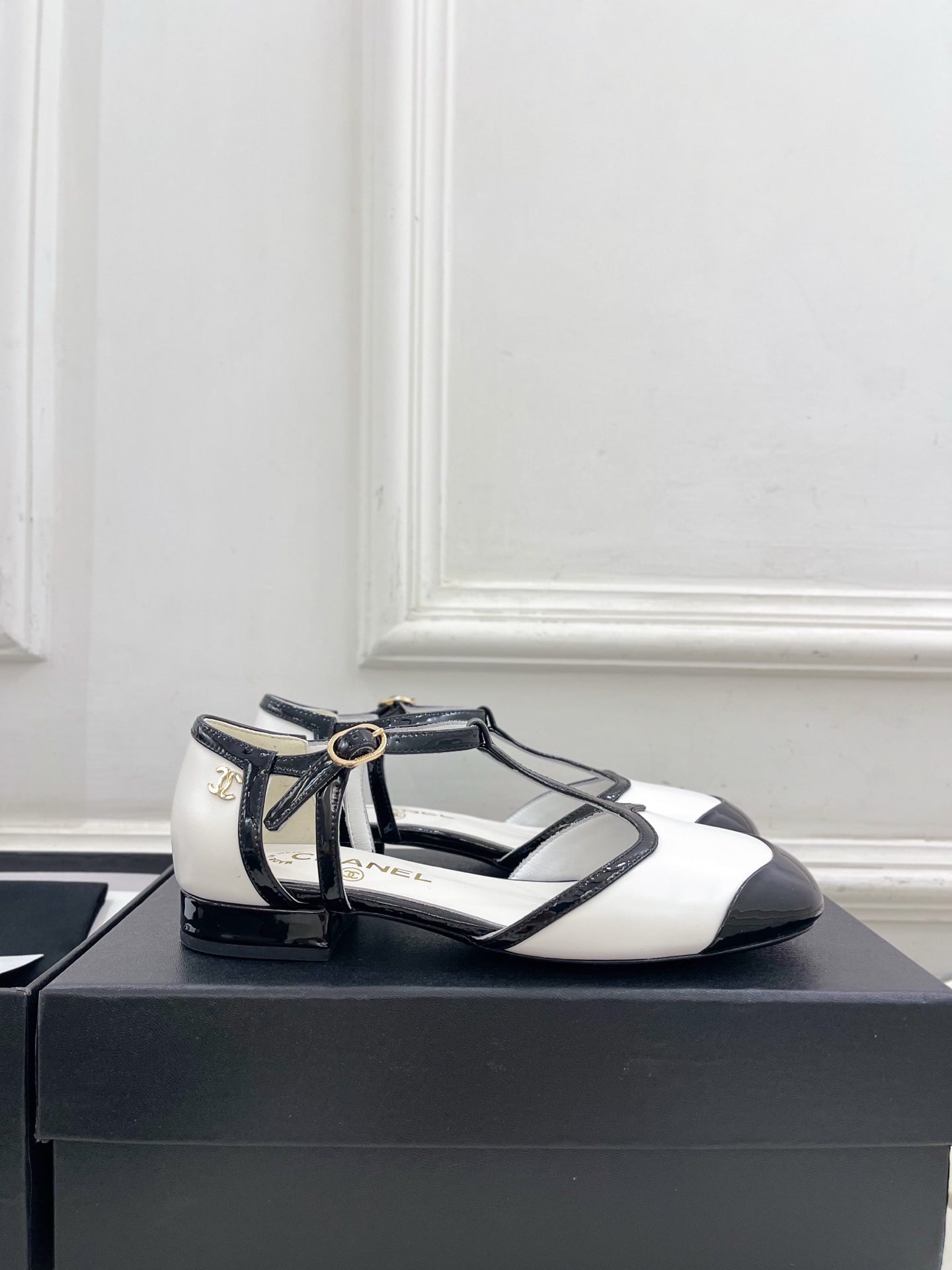 CHANEL 26S T STRAP MARY JANES IN WHITE LAMBSKIN
