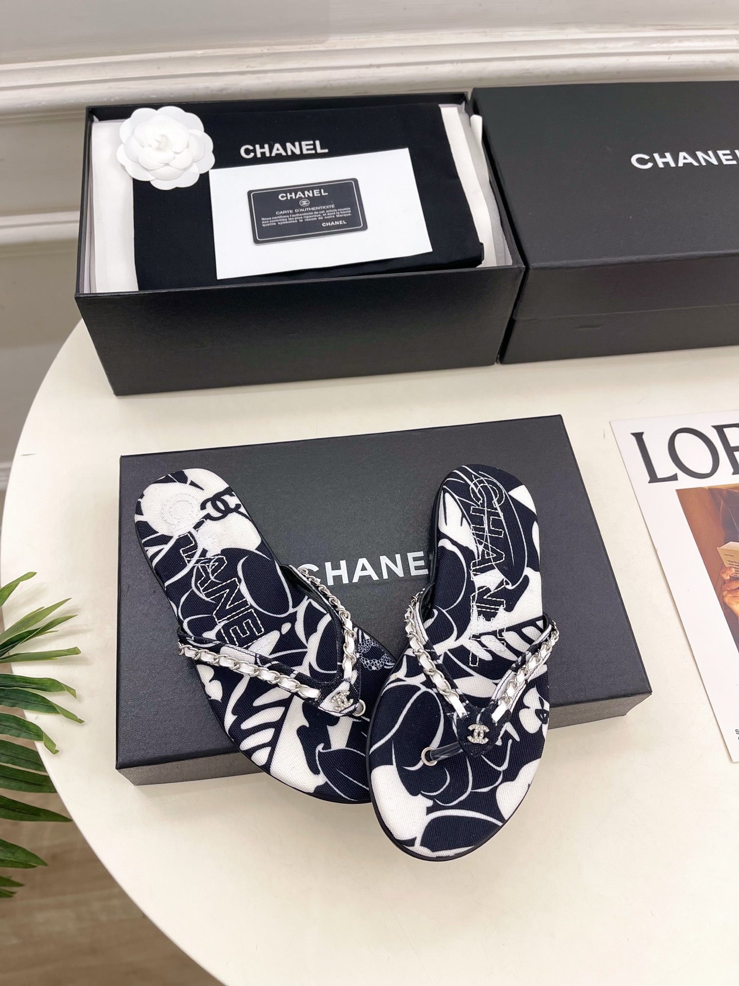 CHANEL 26S THONG SANDALS IN BLACK AND WHITE FLORAL PRINT FABRIC