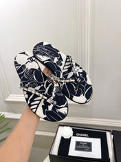CHANEL 26S THONG SANDALS IN BLACK AND WHITE FLORAL PRINT FABRIC