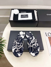 CHANEL 26S THONG SANDALS IN BLACK AND WHITE FLORAL PRINT FABRIC
