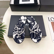 CHANEL 26S THONG SANDALS IN BLACK AND WHITE FLORAL PRINT FABRIC