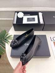 CHANEL 26S BALLET FLATS IN BLACK LAMBSKIN WITH FLOWER EMBELLISHMENT