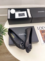 CHANEL 26S BALLET FLATS IN BLACK LAMBSKIN WITH FLOWER EMBELLISHMENT