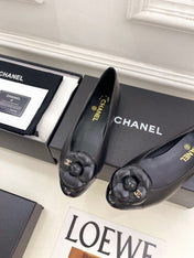CHANEL 26S BALLET FLATS IN BLACK LAMBSKIN WITH FLOWER EMBELLISHMENT