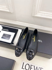 CHANEL 26S BALLET FLATS IN BLACK LAMBSKIN WITH FLOWER EMBELLISHMENT