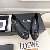 CHANEL 26S BALLET FLATS IN BLACK LAMBSKIN WITH FLOWER EMBELLISHMENT