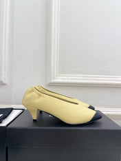 CHANEL 26S SQUARE TOE PUMPS 50 MM IN LIGHT YELLOW LAMBSKIN WITH BLACK TOE CAP