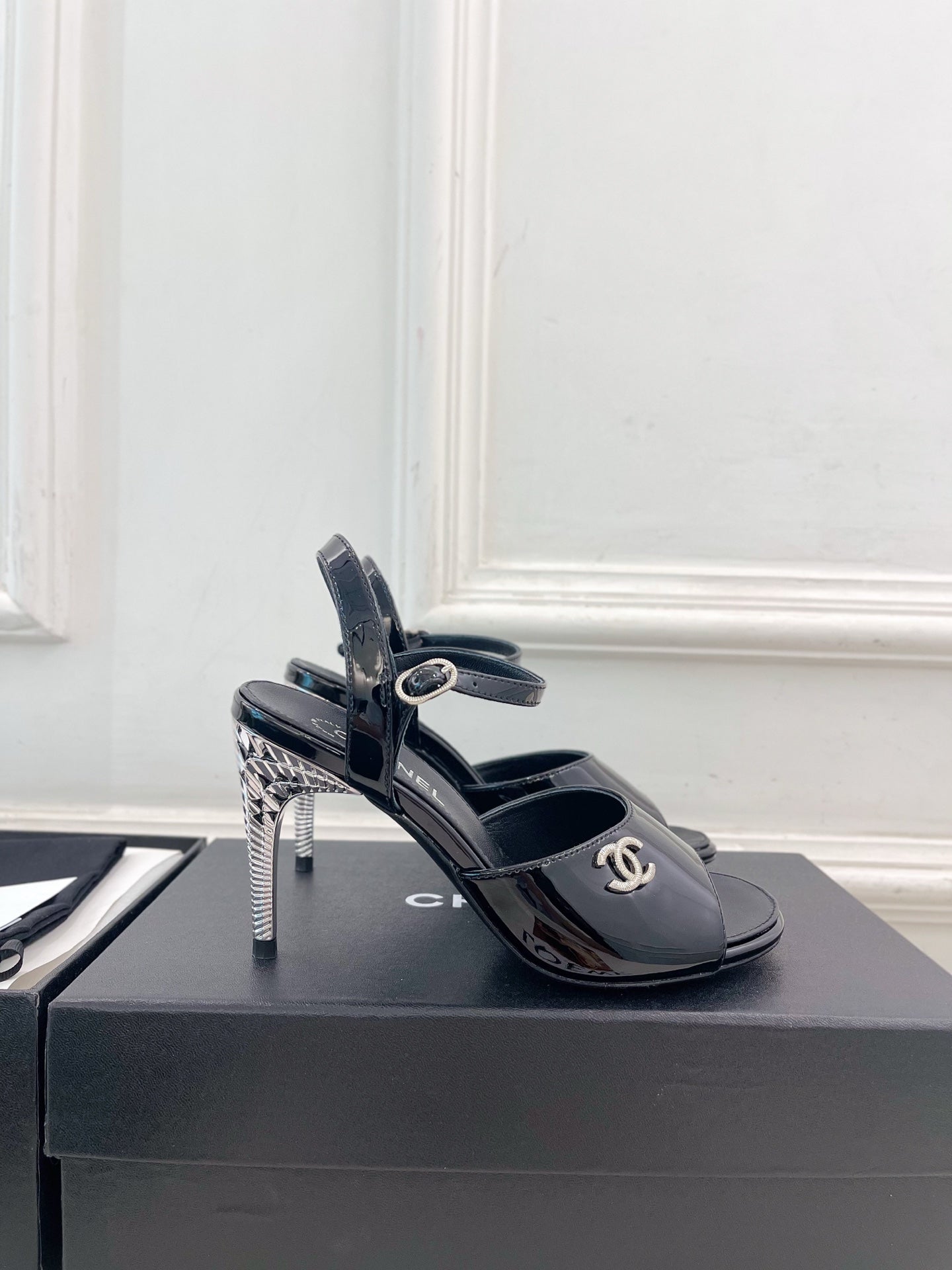 CHANEL 26S HIGH HEEL SLINGBACK SANDALS 90 MM IN BLACK PATENT