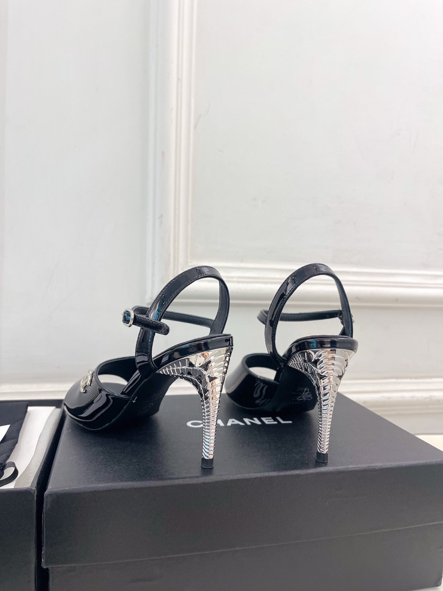 CHANEL 26S HIGH HEEL SLINGBACK SANDALS 90 MM IN BLACK PATENT