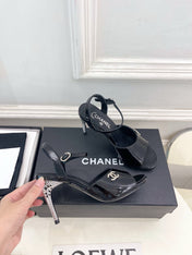 CHANEL 26S HIGH HEEL SLINGBACK SANDALS 90 MM IN BLACK PATENT