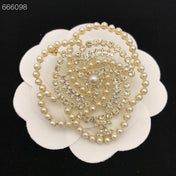 HOLIDAY SNOWFLAKE BROOCH IN WHITE PEARL AND CRYSTAL