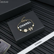 CC BRACELET 25P IN GOLD METAL PEARLY WHITE AND CRYSTAL