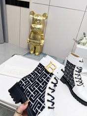 BALMAIN 26S BOOTS IN WHITE CALFSKIN AND BLACK WOOL