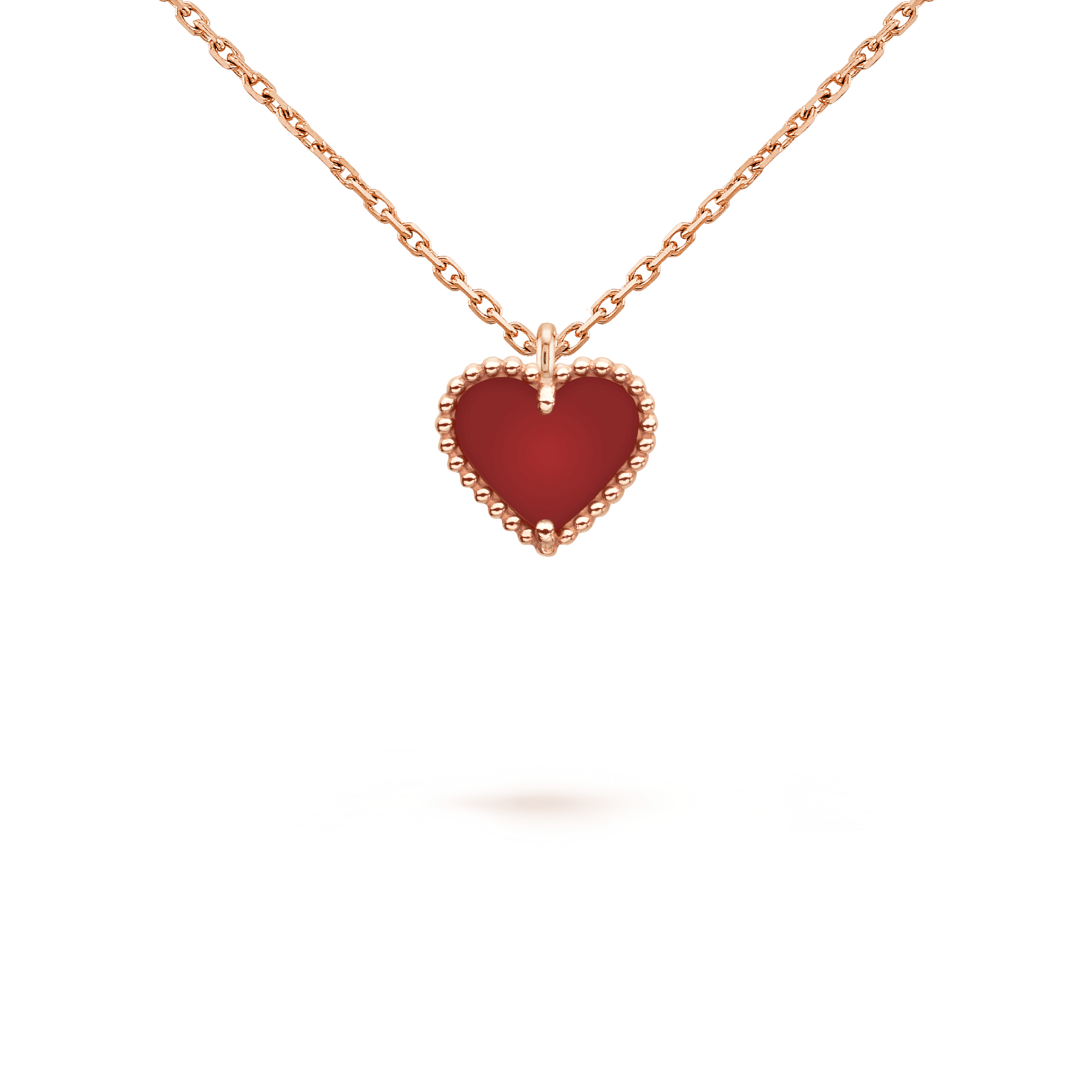 van-cleef-arpels-sweet-alhambra-heart-pendant-rose-gold-carnelian-vcarn59n00-coral-2_aa73fb0d-e25a-4e8e-b500-7779afa6c3e0.png