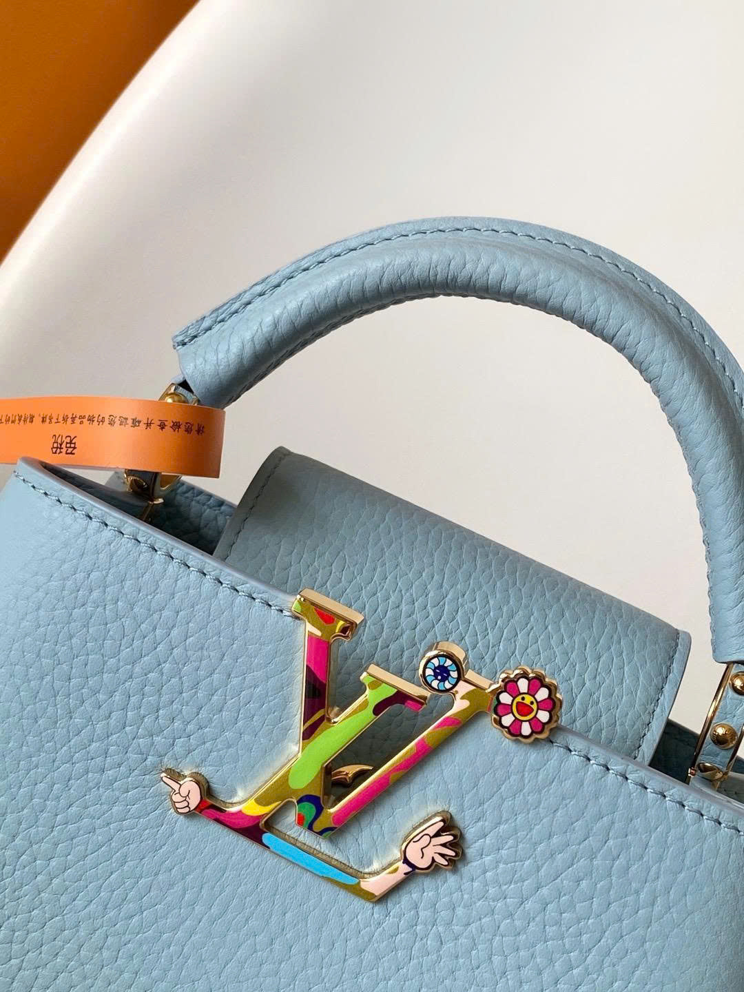 CAPUCINES MINI 21 TAURILLON GOLD  HARDWARE